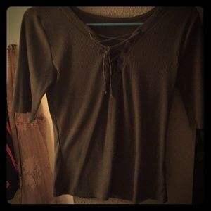 A green laced up in front t-/ dress shirt